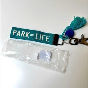 Dog lover keychain. ‘Park=Life.’ Antique brass clip. Pompoms.
